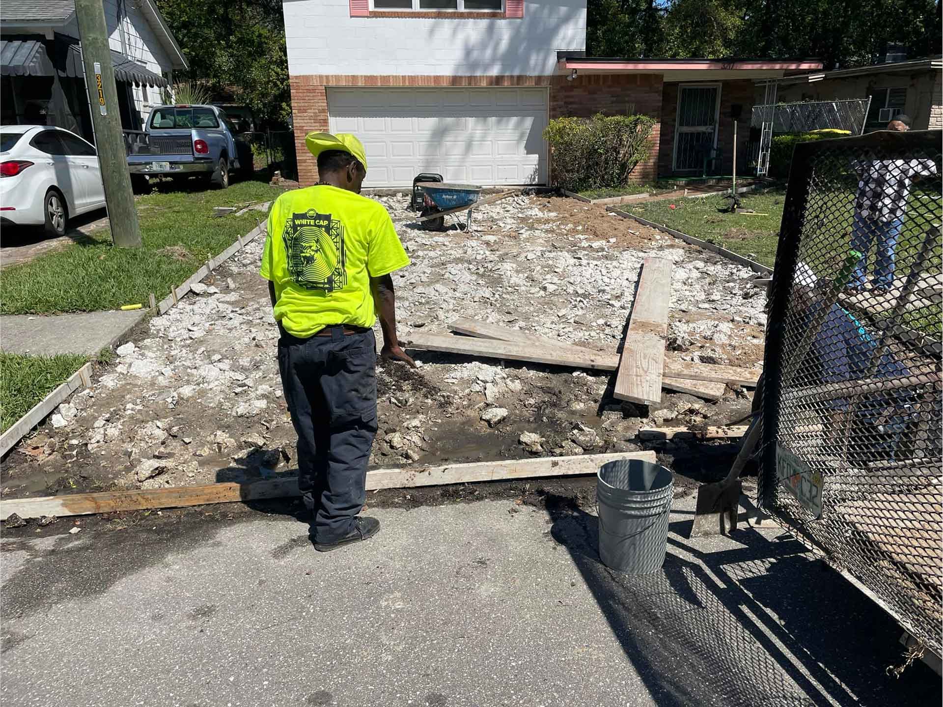 Workers from Ernest Concrete installing a concrete driveway